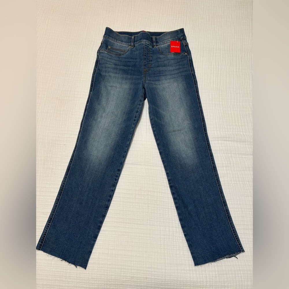 SPANX straight leg jean in size medium, vintage indigo wash. NWT. Never worn.